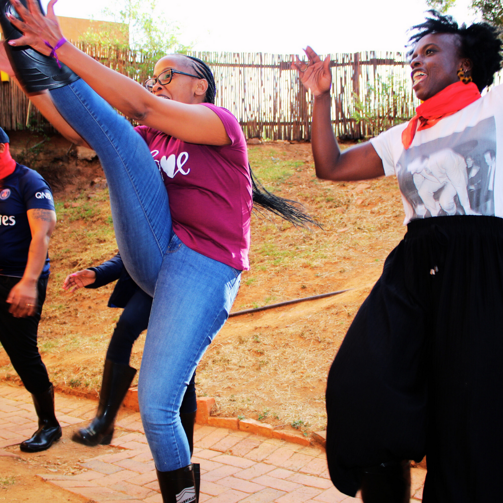 Team participating in gumboot dance